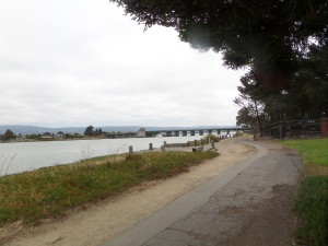 Standing at the end of Packet Landing Road, looking down the trail towards the bridge between Alameda and Bay Farm Island.