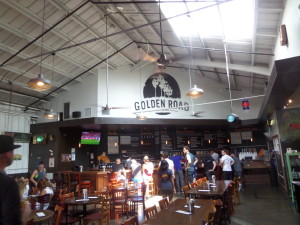 The bar and part of the open-barn structure at Golden Road Brewing