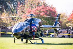 Captain America arrives by helicopter to start the kids' races, of course (photo courtesy of the Heroes Run and ©2016 Photography By Busa)