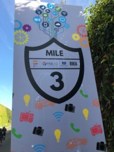 Mile 3 mile marker sign, with technology-themed icons