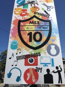 Mile 10 mile marker featuring art, music, photography, sculpture