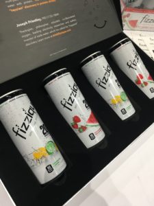 display box of four cans of fizzique