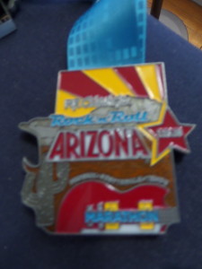 The first of the four Rock 'n' Roll Arizona puzzle piece medals