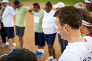 Runners supporting each other