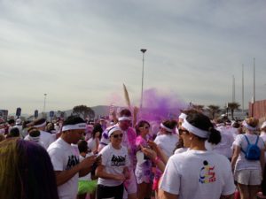 A burst of color at the starting line. (Individual runner's packet, not a mile-marker color zone!)