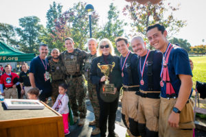 A few of the heroes, sporting their team's medallions (courtesy of the Heroes Run and ©2016 Photography By Busa)